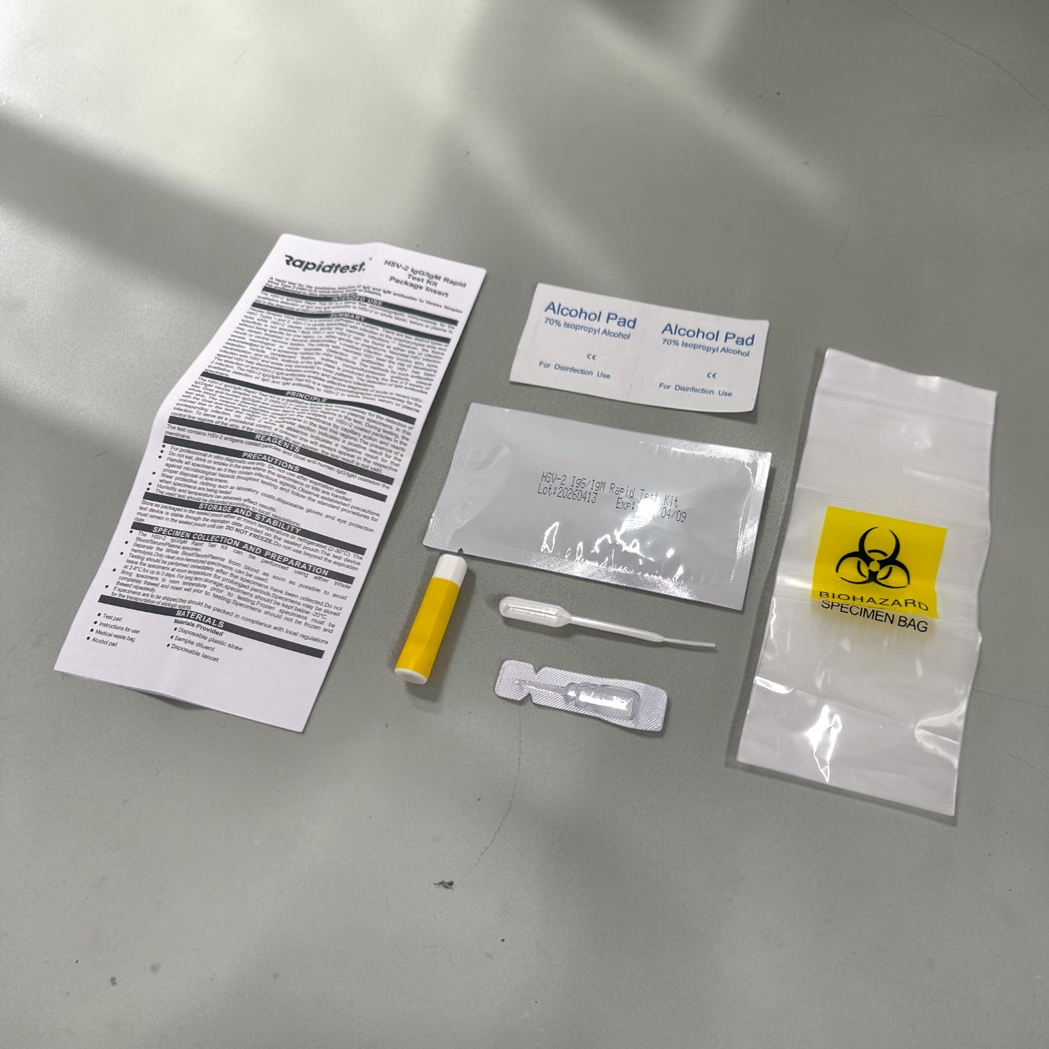 Collection of medical or diagnostic test items on a gray surface