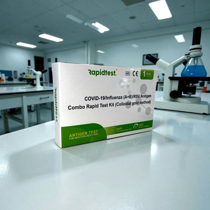 Rapidtest COVID-19/Influenza (A+B)/RSV Antigen Combo Rapid Test Kit on a laboratory counter.