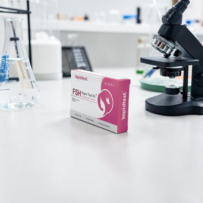 Rapidtest FSH (follicle-stimulating hormone) Rapid Test Kit box on a beige background - Fertility, Menopause and Perimenopause testing - rapidtest.co