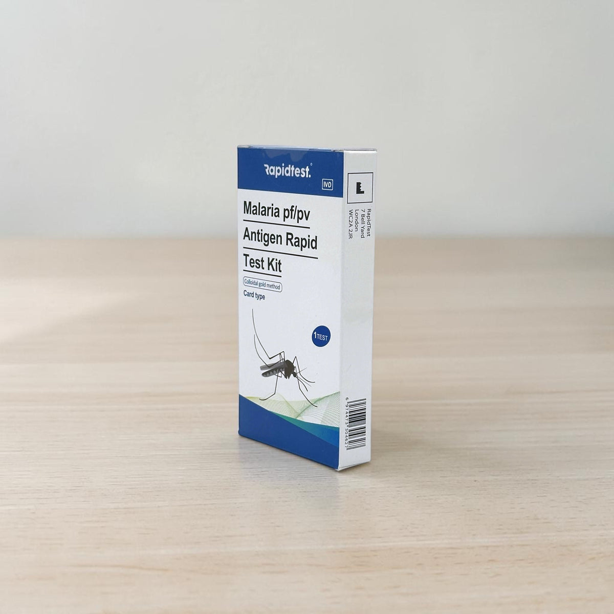 Malaria pf/pv Antigen self test at home kit - Travel Tests on wood table - STIhealthcheck.com